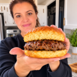 Freshly baked 3 ingredient carnivore burger buns on wooden cutting board