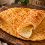 Carnivore Flatbread (3-Ingredient, Zero-Carb, Foolproof) 25 Freshly baked carnivore flatbread folded to show its soft flexible texture