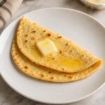 Carnivore Flatbread (3-Ingredient, Zero-Carb, Foolproof) 34 Folded carnivore flatbread on a white plate