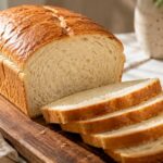 High Protein Sandwich Bread (Soft, Sliceable & Easy Homemade Recipe) 18 Soft homemade high protein sandwich bread with a fluffy texture and golden crust